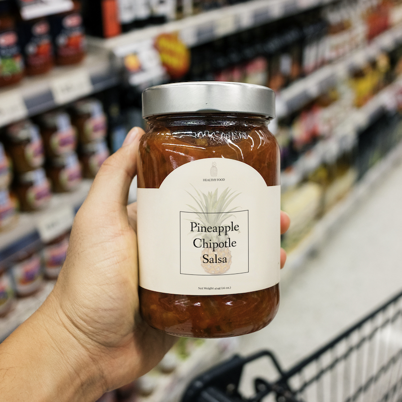 Product label printing for jars of pineapple.