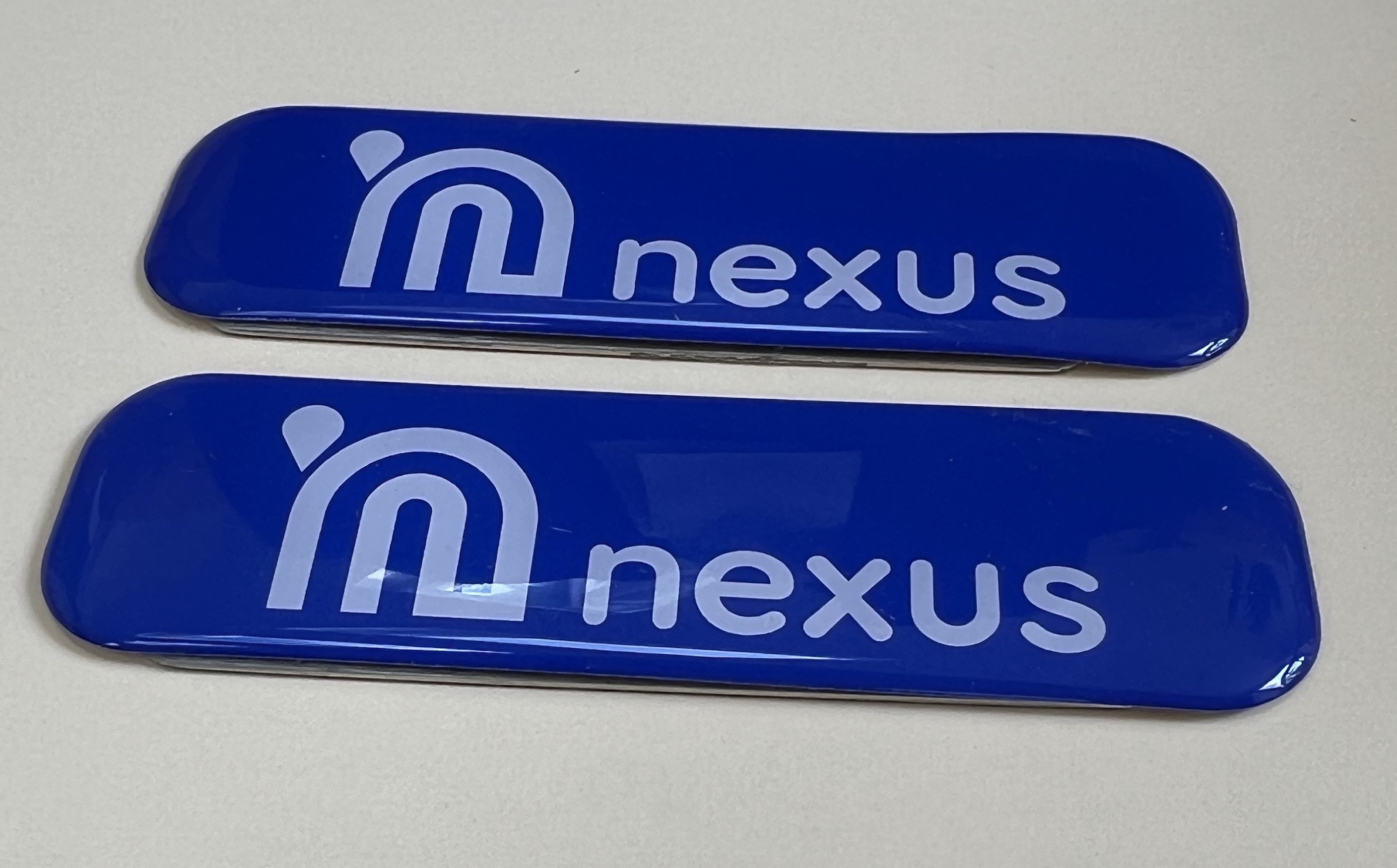 Resin domed 3D labels close up