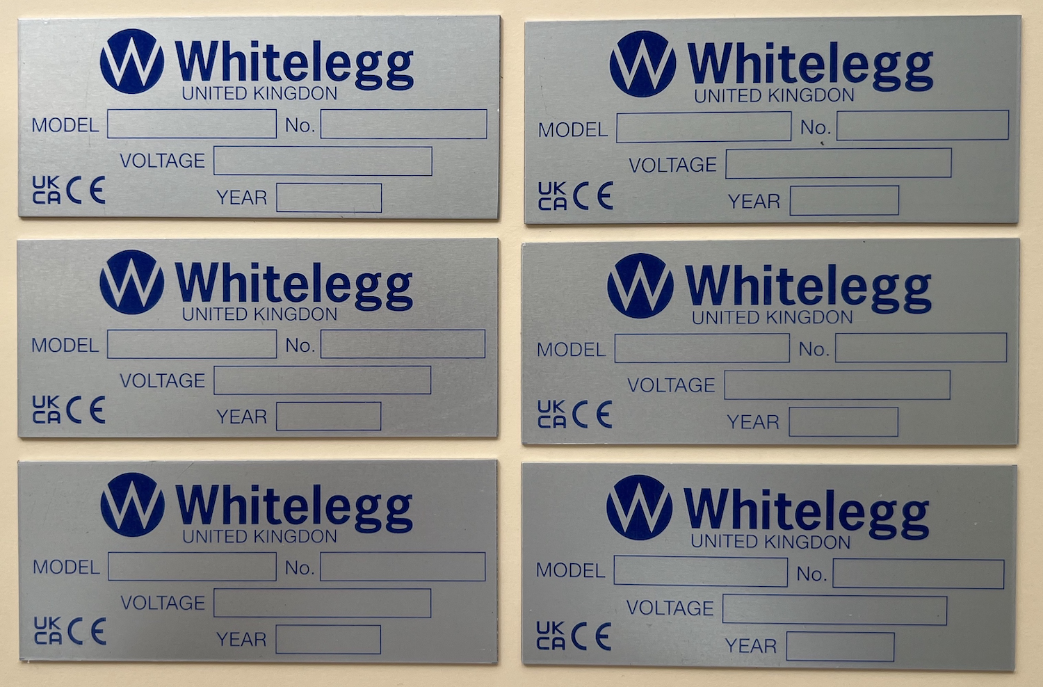 Engraved metal labels which are personalised for your company.