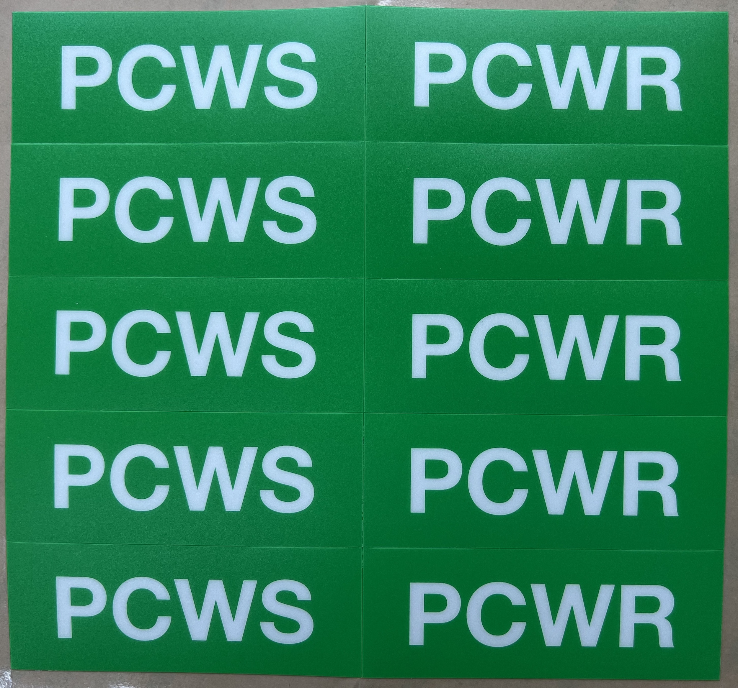 Silk screen labels on a roll from Matform Ltd.